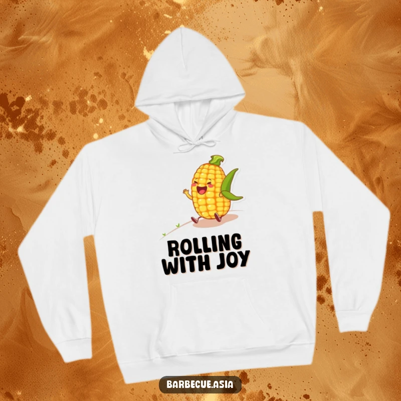 Funny corn on the cob character rolling down a hill laughing, featured on a cozy hoodie.
