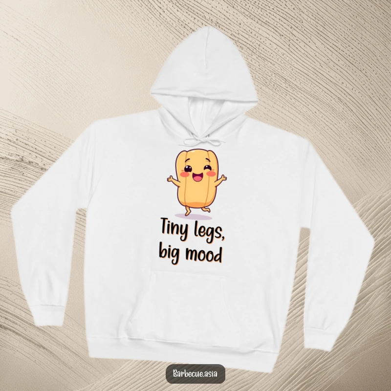 Funny hot dog character with tiny legs doing a happy dance, featured on a warm and cozy hoodie.